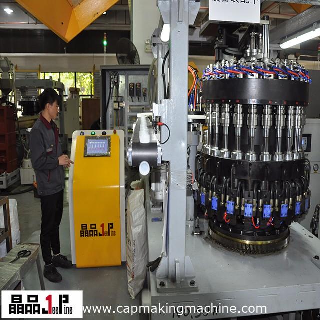 plastic cap moulding machine.jpg plastic cap moulding machine.jpg